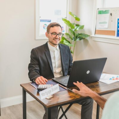 Photograph of a Mortgage Broker Sitting